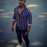 a man standing in the middle of a street