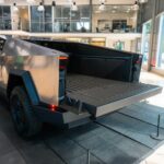 A truck is parked inside of a building