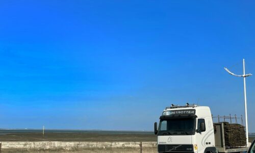 a truck is parked on the side of the road