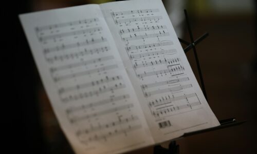 a notebook with a pen and paper