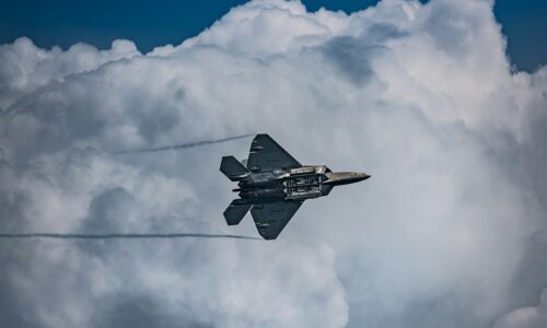 a fighter jet flying through the air