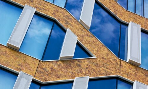 A close up of a building with many windows