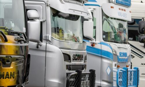 a group of trucks are parked