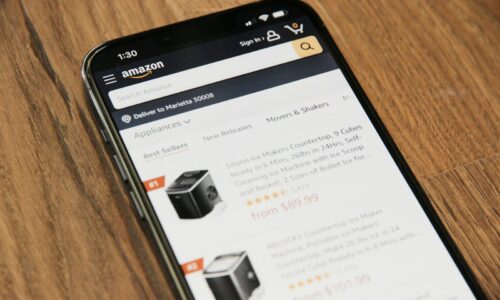 a cell phone sitting on top of a wooden table