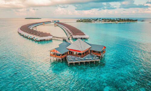 aerial photography of resort rooms and island
