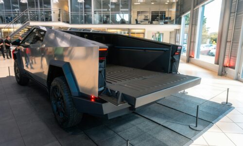 A truck is parked inside of a building